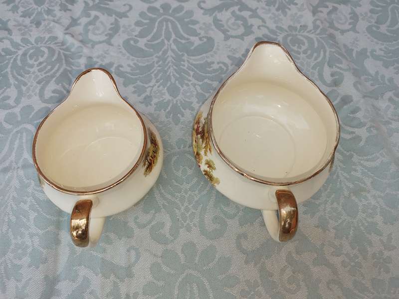 TWO VINTAGE ALFRED MEAKEN ENGLAND JUGS WITH GOLD TRIM SOLD AS IS