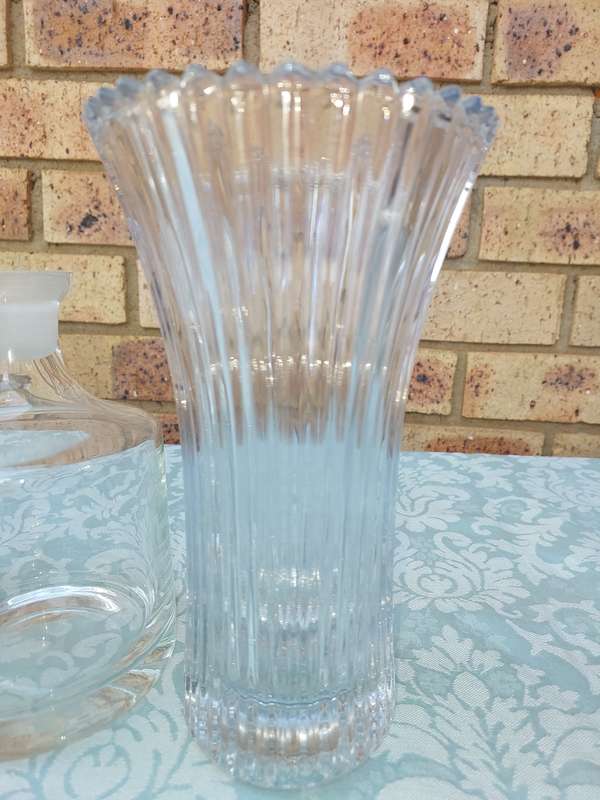 A vintage joblot decanters and vase sold as is