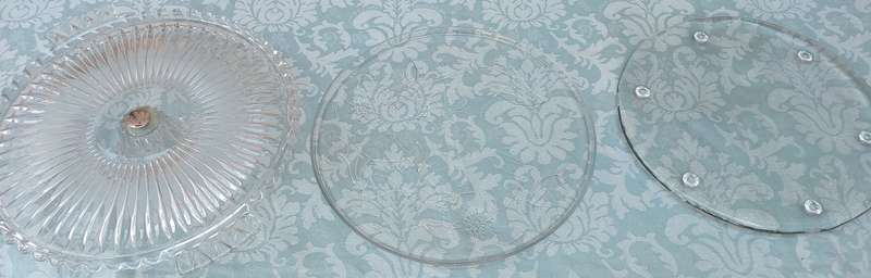 A CLASSIC COLLECTION OF GLASS SERVING PLATTERS SOLD AS IS