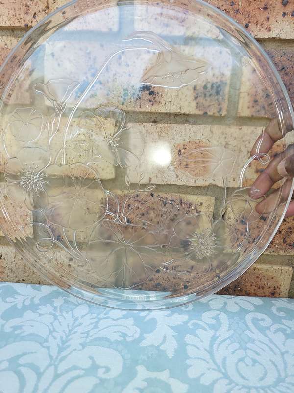 A CLASSIC COLLECTION OF GLASS SERVING PLATTERS SOLD AS IS