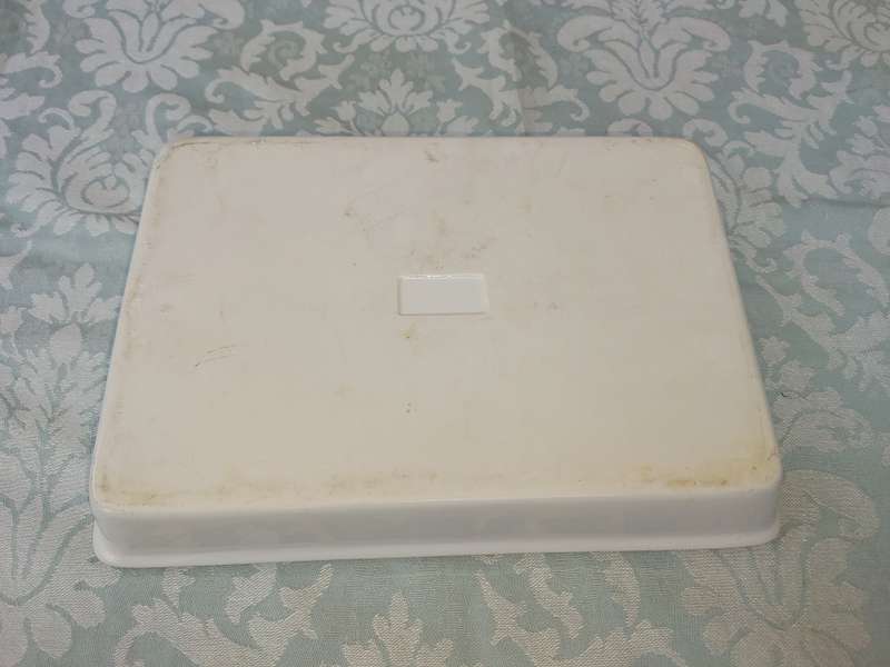 A hand-painted floral blue and white porcelain oven-proof DISHES
