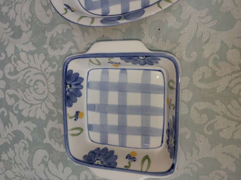 A hand-painted floral blue and white porcelain oven-proof DISHES