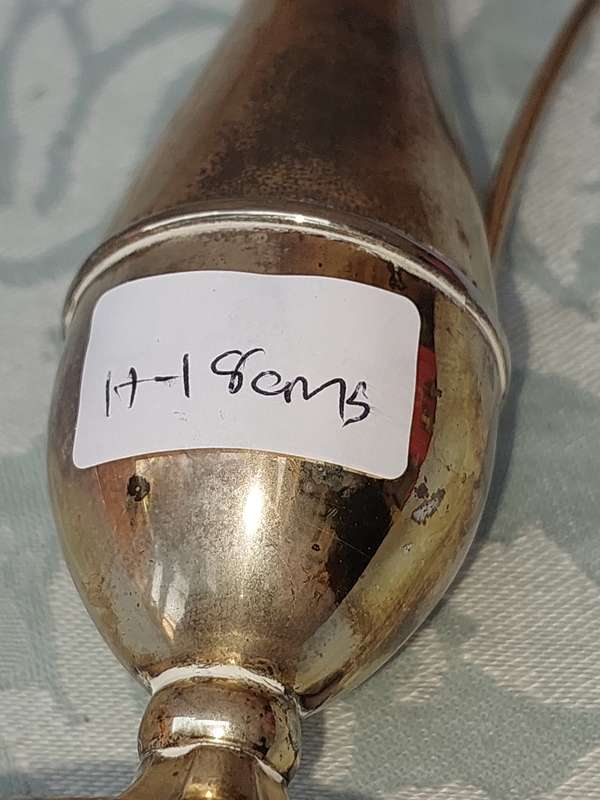 A SILVER PLATED FLOWER VASE SOLD AS IS