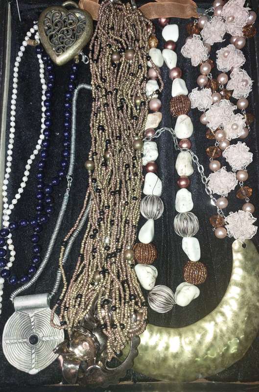 A COLLECTION OF COSTUME NECKLACES SOLD AS IS
