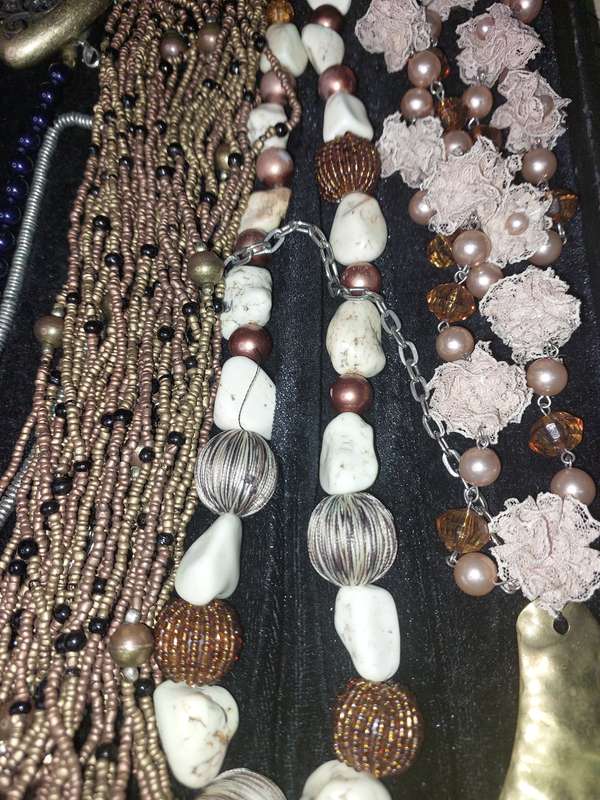 A COLLECTION OF COSTUME NECKLACES SOLD AS IS