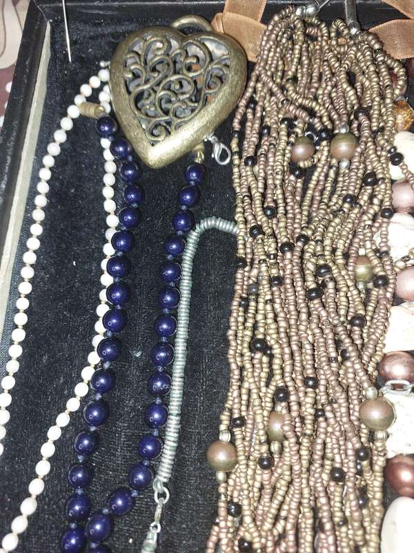 A COLLECTION OF COSTUME NECKLACES SOLD AS IS