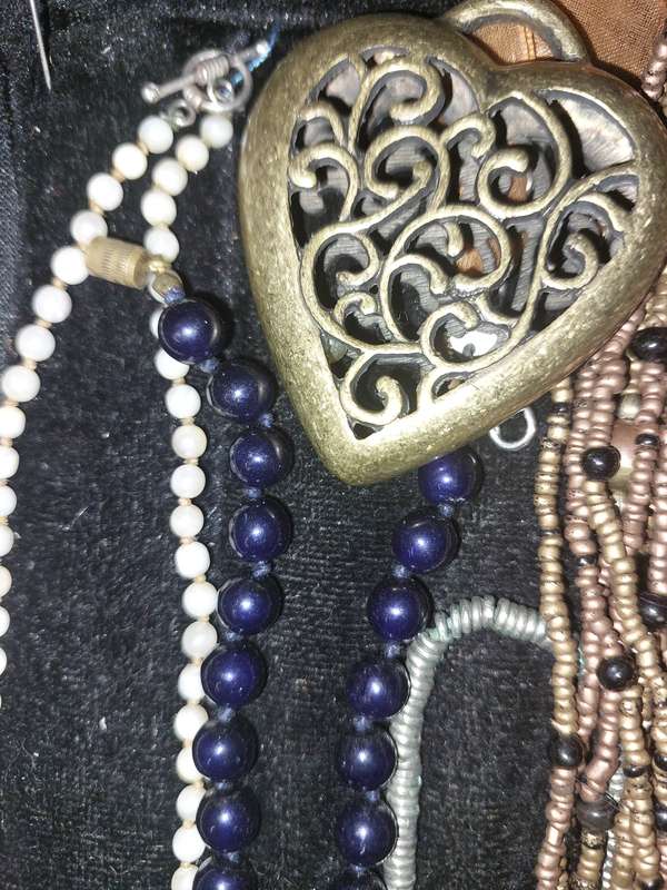 A COLLECTION OF COSTUME NECKLACES SOLD AS IS