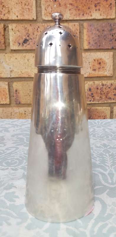 A VINTAGE SILVER PLATED SUGAR CASTER FROM THE SAR OLD STOCK SOLD AS IS
