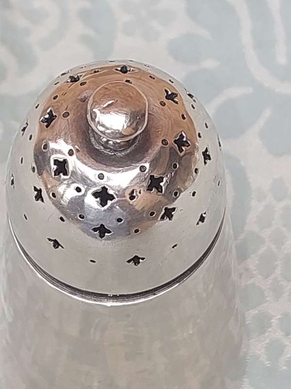 A VINTAGE SILVER PLATED SUGAR CASTER FROM THE SAR OLD STOCK SOLD AS IS