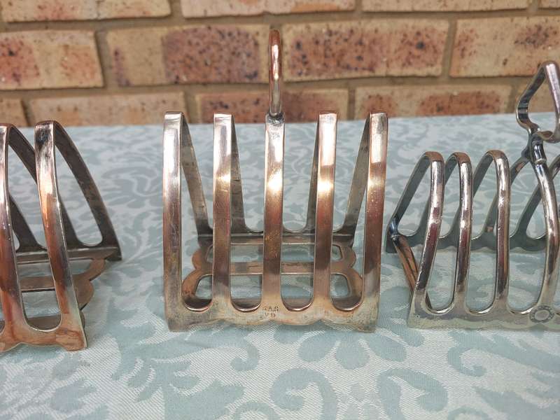 OLD VINTAGE  UTENSILS TOAST STANDS SOLD AS IS