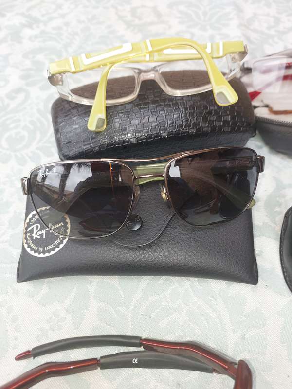 A JOBLOT COLLECTION SUNGLASSES AND FRAMES SOLD AS IS