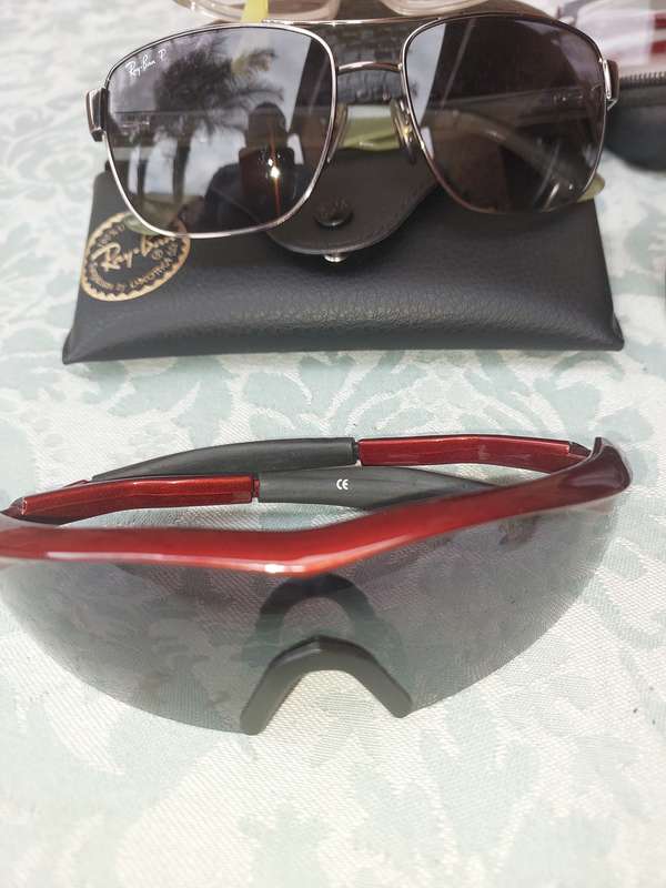 A JOBLOT COLLECTION SUNGLASSES AND FRAMES SOLD AS IS