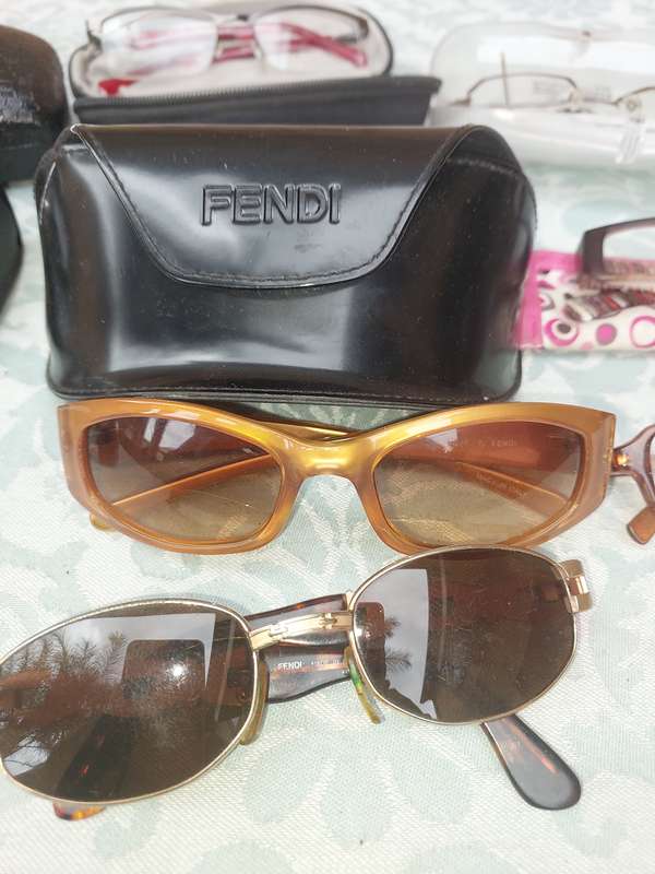 A JOBLOT COLLECTION SUNGLASSES AND FRAMES SOLD AS IS