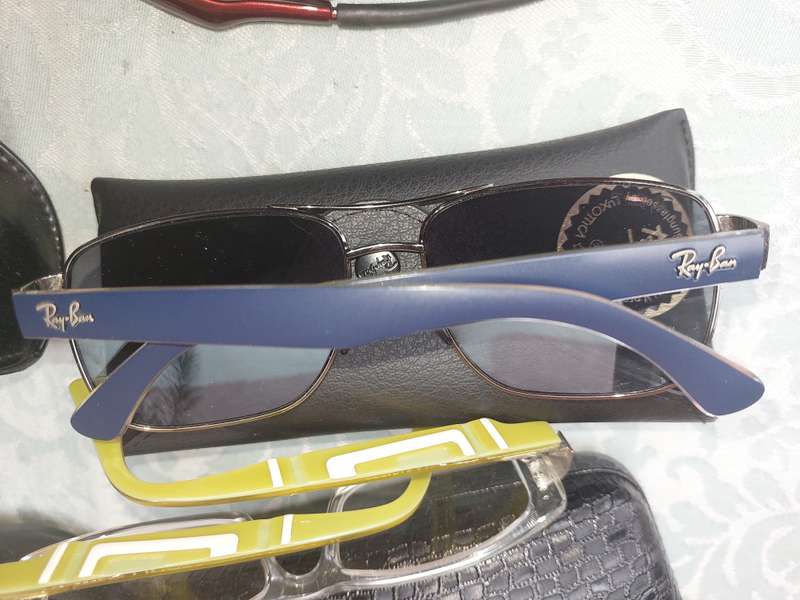 A JOBLOT COLLECTION SUNGLASSES AND FRAMES SOLD AS IS