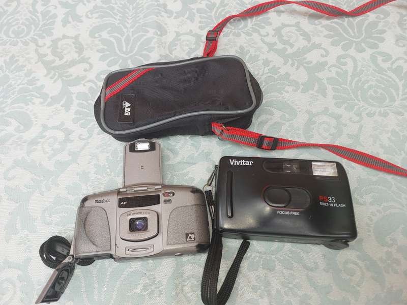 TWO VNTAGE CAMERAS SOLD AS IS NOT TESTED