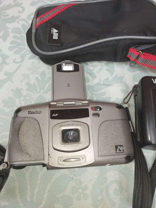 TWO VNTAGE CAMERAS SOLD AS IS NOT TESTED