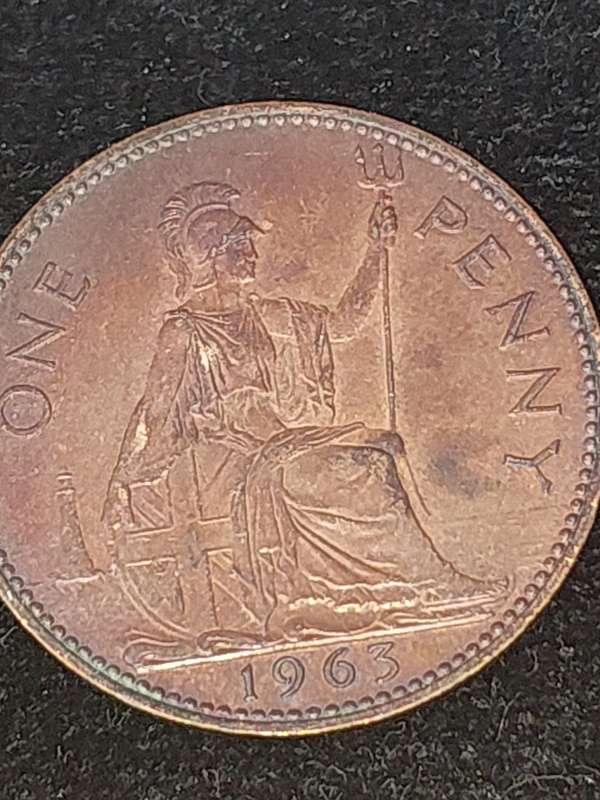AN ANTIQUE JOBLOT COLLECTION PENNY'S AND RAILWAY TOKENS FROM BRITTAIN AND SOUTH AFRICA SOLD AS IS