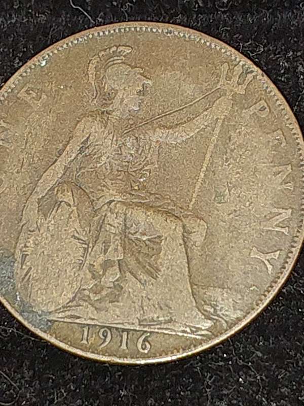 AN ANTIQUE JOBLOT COLLECTION PENNY'S AND RAILWAY TOKENS FROM BRITTAIN AND SOUTH AFRICA SOLD AS IS
