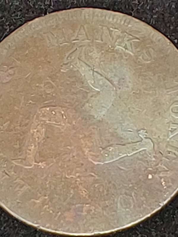 AN ANTIQUE JOBLOT COLLECTION PENNY'S AND RAILWAY TOKENS FROM BRITTAIN AND SOUTH AFRICA SOLD AS IS