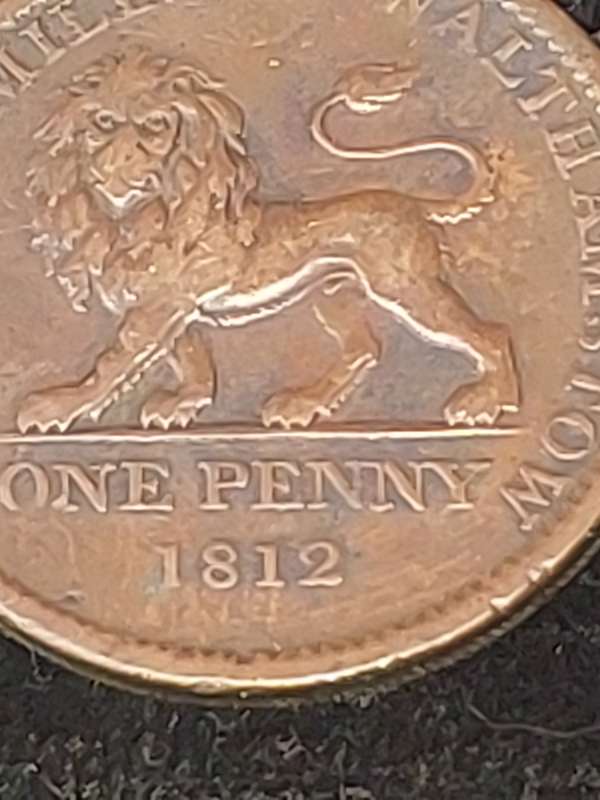 AN ANTIQUE JOBLOT COLLECTION PENNY'S AND RAILWAY TOKENS FROM BRITTAIN AND SOUTH AFRICA SOLD AS IS