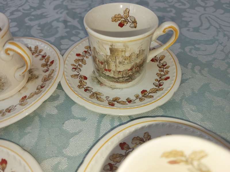A SET OF FOUR COFFEE CUPS WITH SAUCERS BY SWINNERTON STEFFORDSHIRE ENGLAND MAJESTIC VELLUM REG NO83