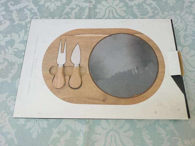 AN ART DECOR SLATE CHEESE BOARD SOLD AS IS