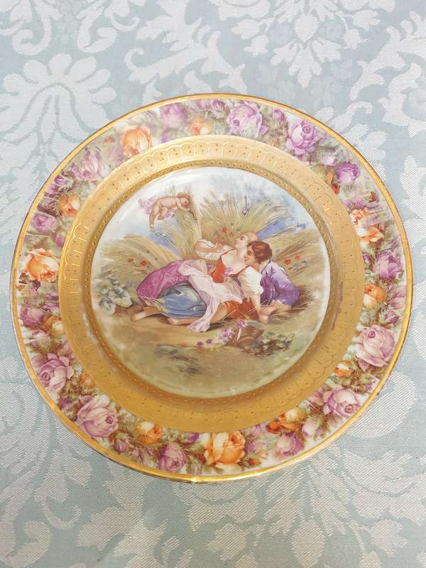 An art decor vintage platter with a Bavarian scene sold as is