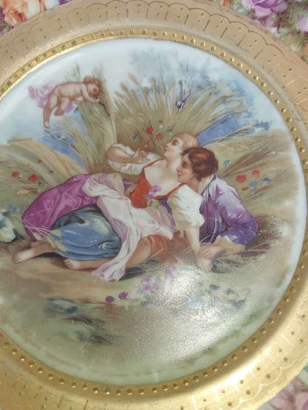 An art decor vintage platter with a Bavarian scene sold as is