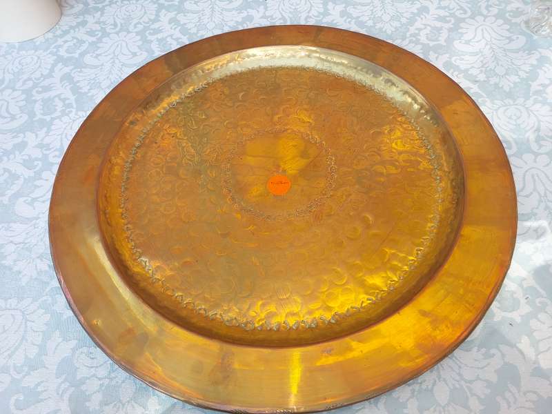 A HUGE 58 CENTIMETER DIAMETER  MORROCAN STYLE BRASS SERVING TRAY SOLD AS IS