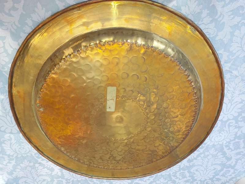 A HUGE 58 CENTIMETER DIAMETER  MORROCAN STYLE BRASS SERVING TRAY SOLD AS IS