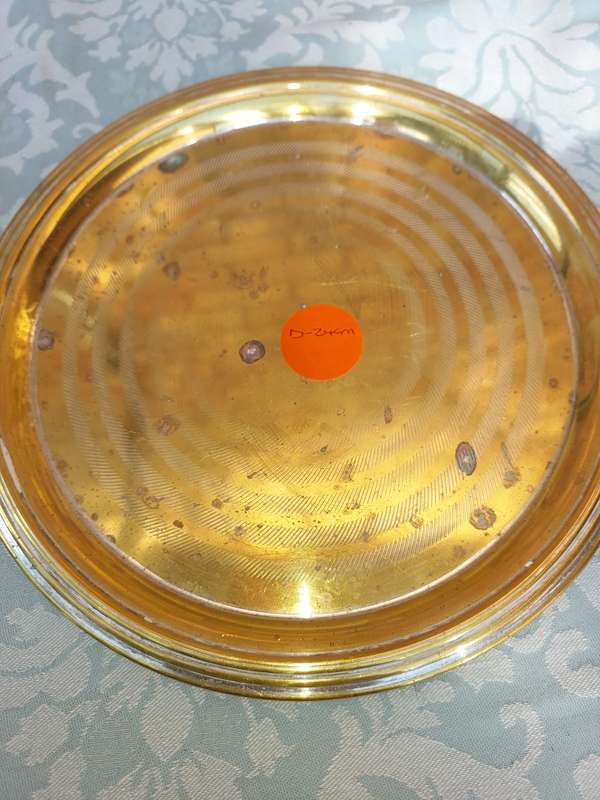 TWO VINTAGE ROUND SERVING TRAYS SOLD AS IS