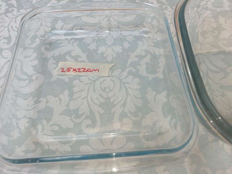 A COLLECTION OF OVEN PROOF CASEROLES SOLD AS IS