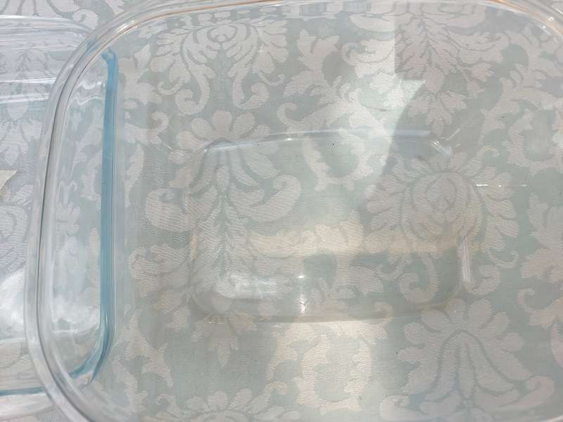 A COLLECTION OF OVEN PROOF CASEROLES SOLD AS IS