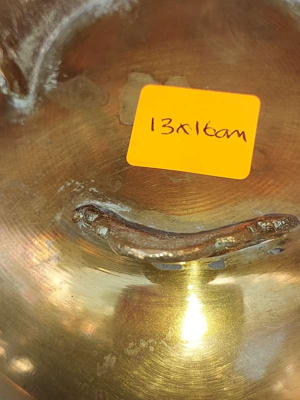 A VINTAGE BRASS FOOTED POTPLANT HOLDER SOLD AS IS R200