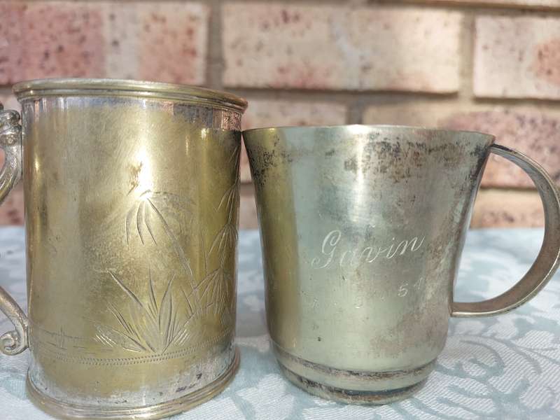 A COLLECTION OF SILVER PLATED BEER MUGS SOLD AS IS