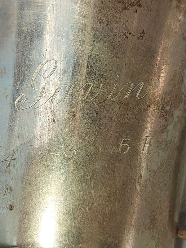 A COLLECTION OF SILVER PLATED BEER MUGS SOLD AS IS