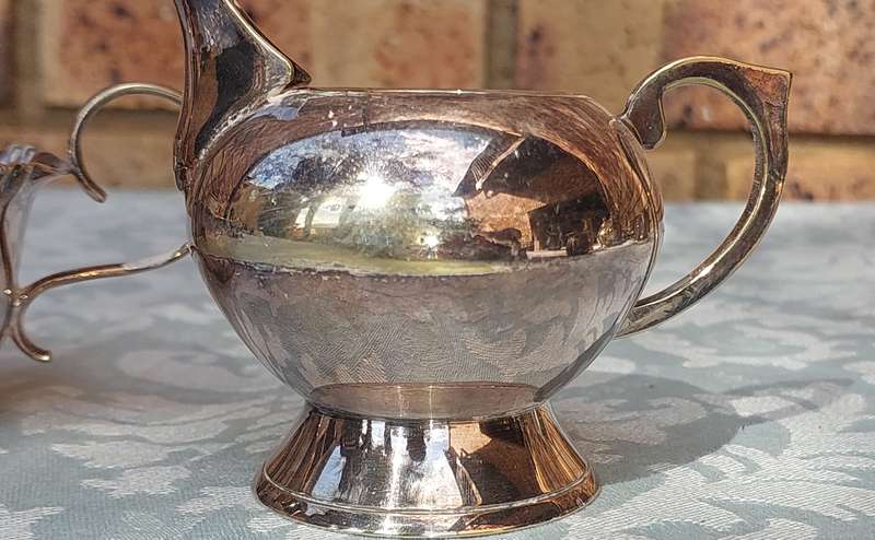 A COLLECTION OF KITCHEN UTENSILS SILVER PLATED SOLD AS IS