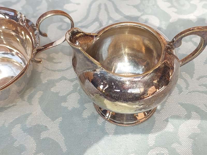 A COLLECTION OF KITCHEN UTENSILS SILVER PLATED SOLD AS IS
