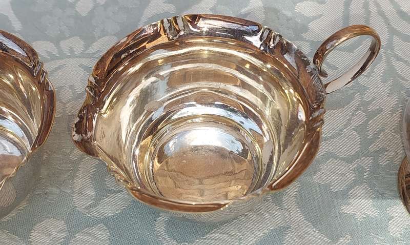 A COLLECTION OF KITCHEN UTENSILS SILVER PLATED SOLD AS IS