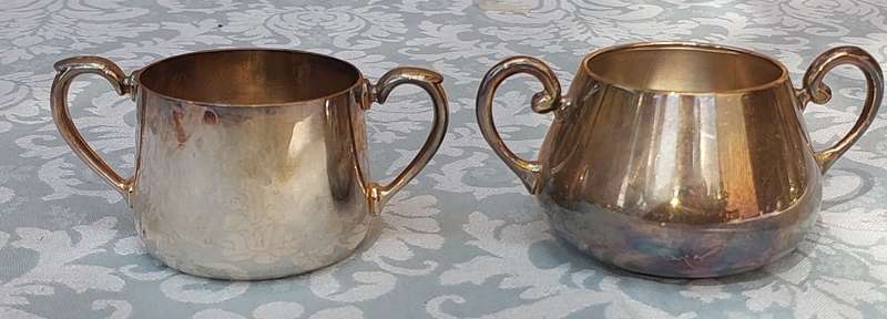 A PAIR OF KITCHEN UTENSILS EPNS SOLD AS IS