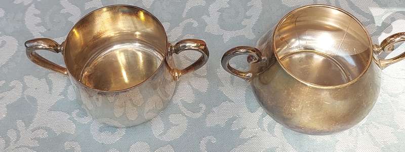 A PAIR OF KITCHEN UTENSILS EPNS SOLD AS IS