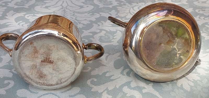 A PAIR OF KITCHEN UTENSILS EPNS SOLD AS IS