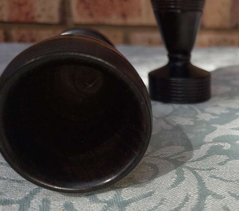 A PAIR OF WOODEN VASES SOLD AS IS R100