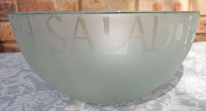 A BEAUTIFUL FROSTED SALAD BOWL SOLD AS IS