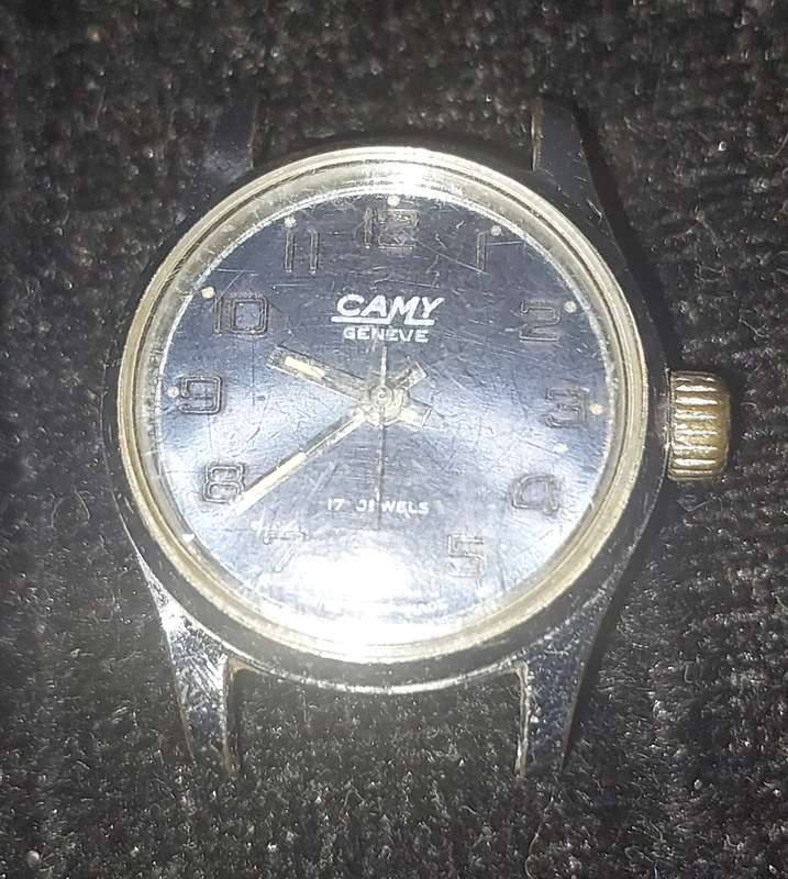 A VINTAGE CAMY 17 JEWELS SWISS MADE SERIAL NUMBER 1201 WORKING, WITH OUT A STRAP AND HAS SOME SCRATC