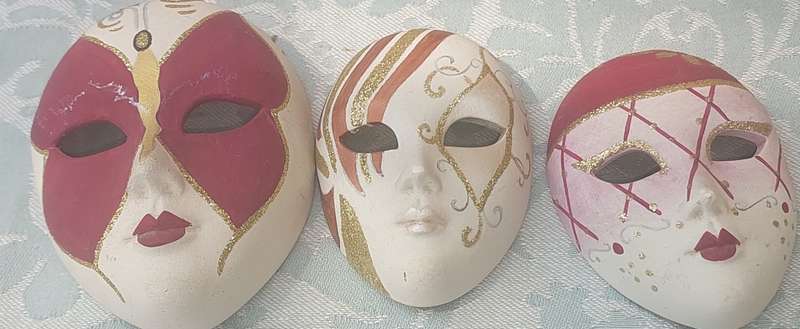 A 31 CENTIMETER PINK COLOURED CERAMIC WITH GOOD INLAY OWL STATUE