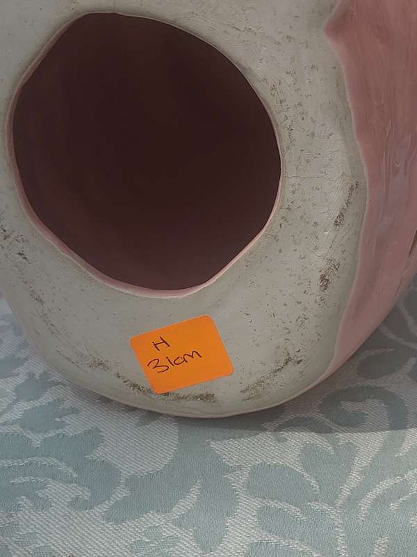 A 31 CENTIMETER PINK COLOURED CERAMIC WITH GOOD INLAY OWL STATUE