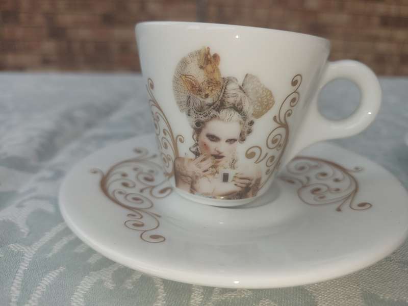 TWO COLLECTABLE LAVAZA COFFEE EXPRESSO CUPS AND SAUCERS SOLD AS IS