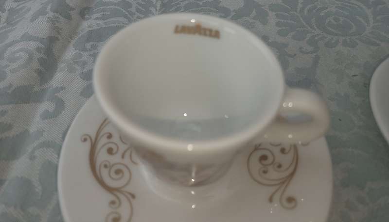 TWO COLLECTABLE LAVAZA COFFEE EXPRESSO CUPS AND SAUCERS SOLD AS IS