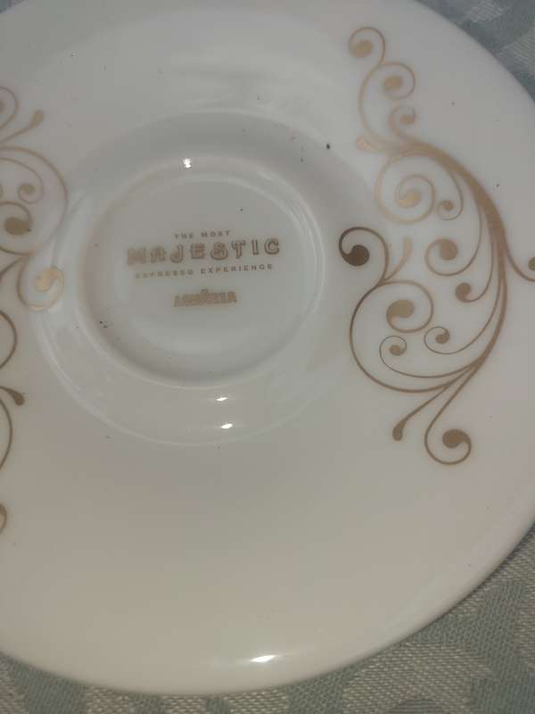 TWO COLLECTABLE LAVAZA COFFEE EXPRESSO CUPS AND SAUCERS SOLD AS IS